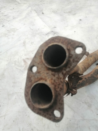 Приемная труба глушителя